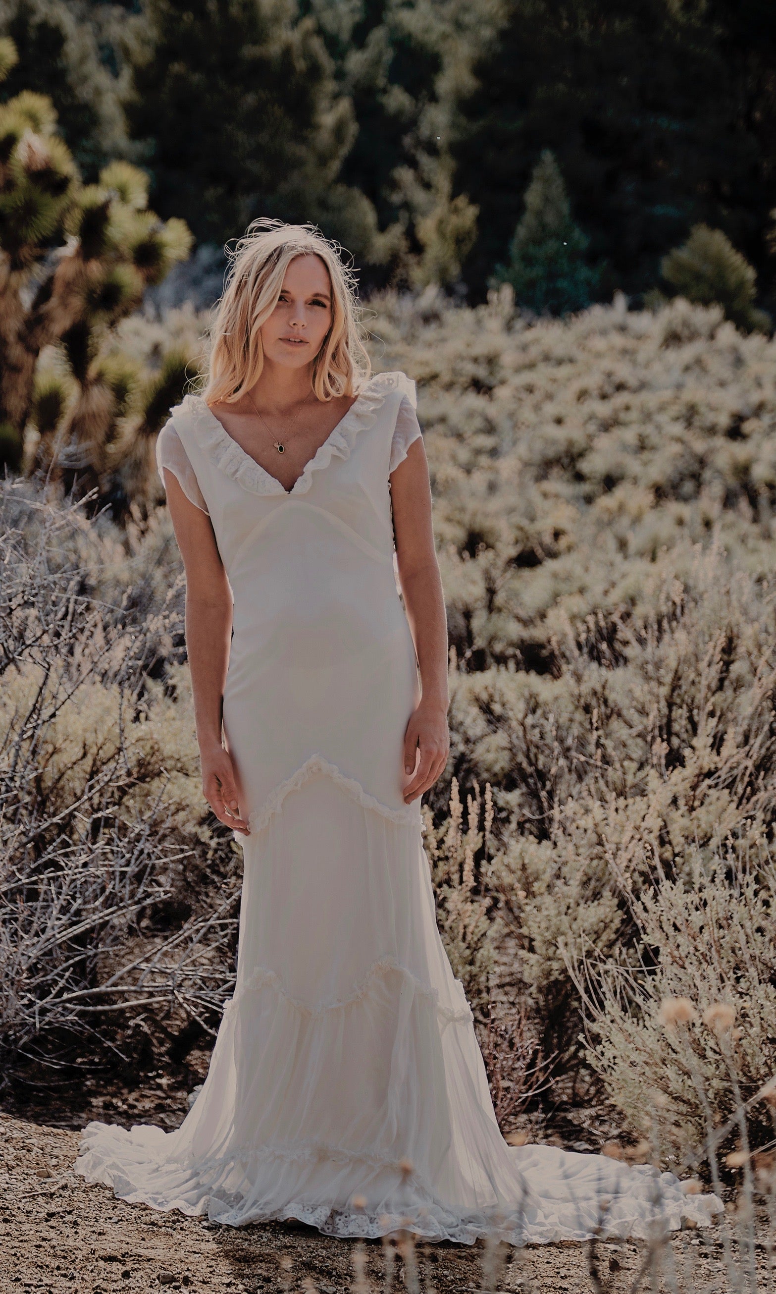 Ribbed silk low back tiered wedding gown